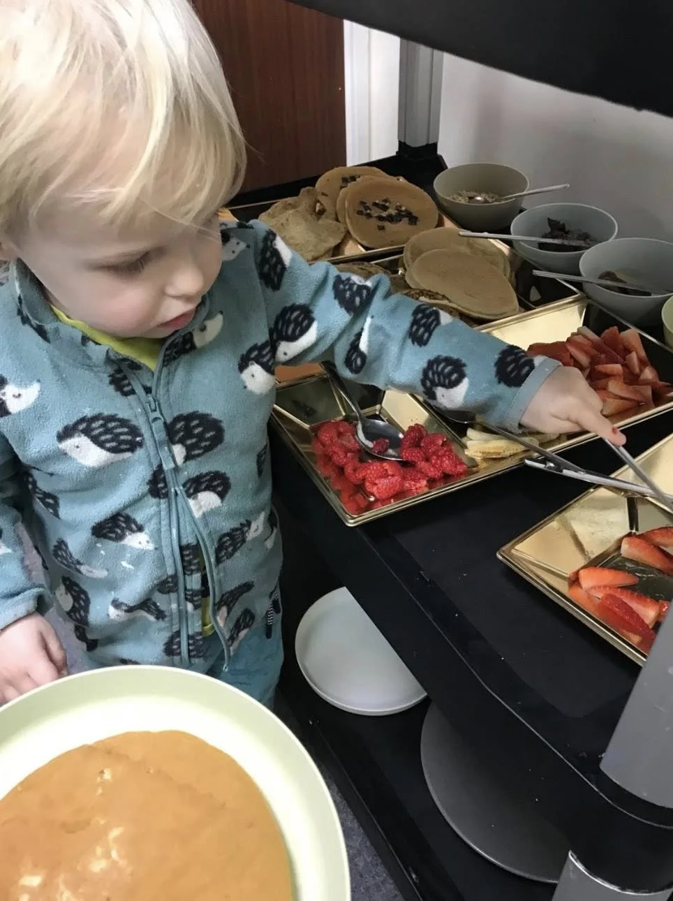 A child at an activity table at Keep Fit Nursery