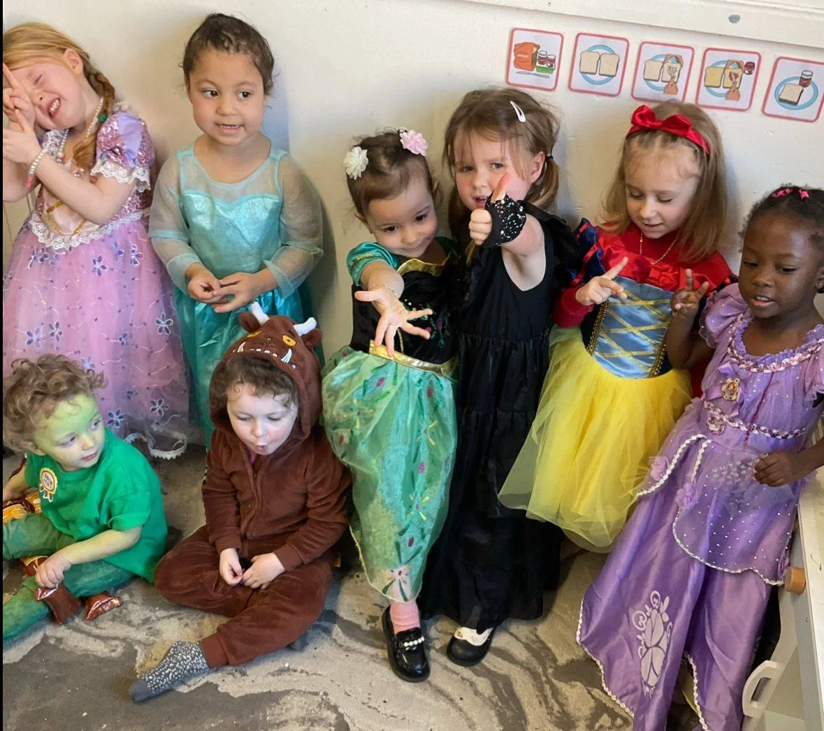 Children in dressing-up clothes at Roobyloos Nursery